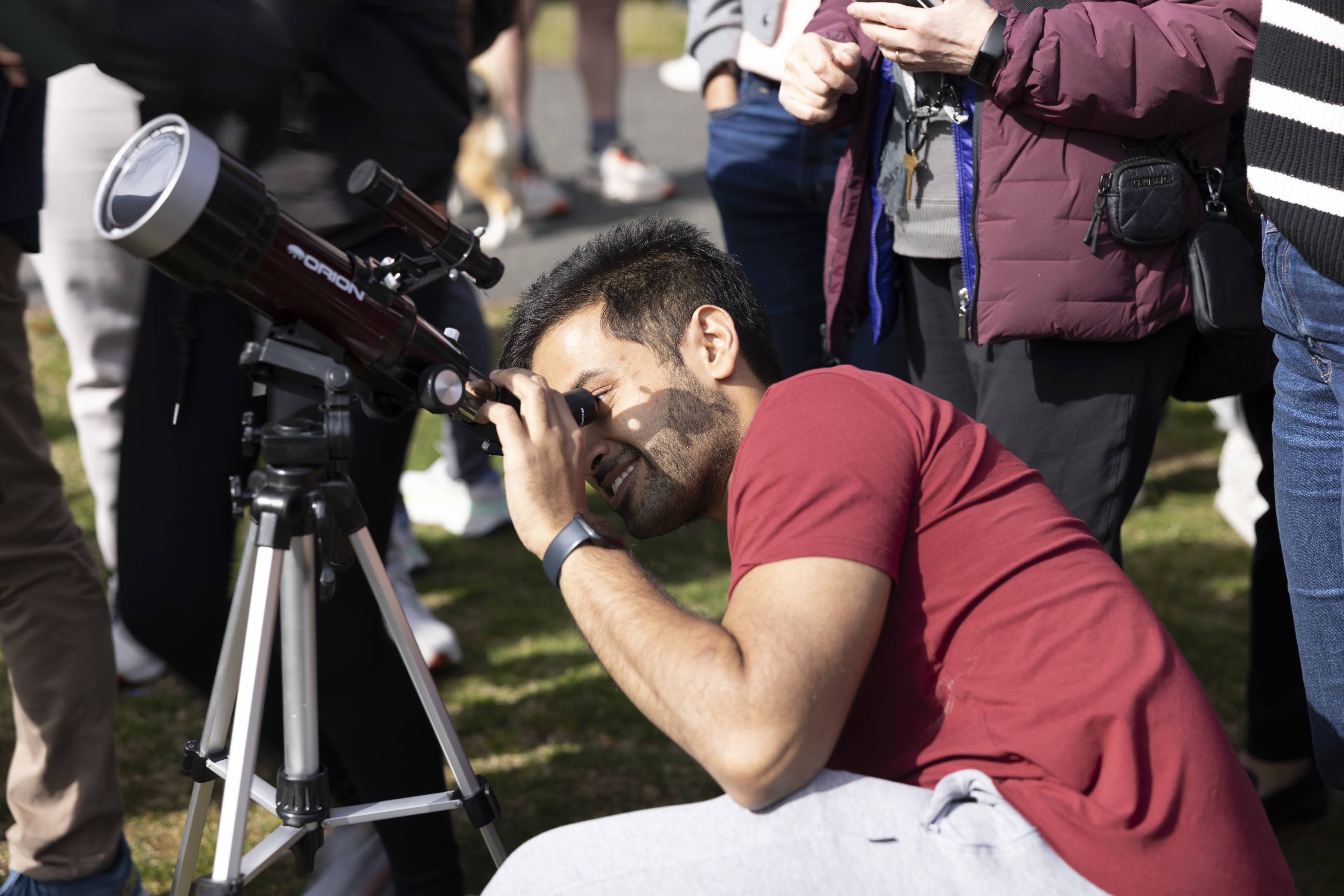 Public viewing of the solar eclipse of 8 April 2024 with a solar filter at Harvard University